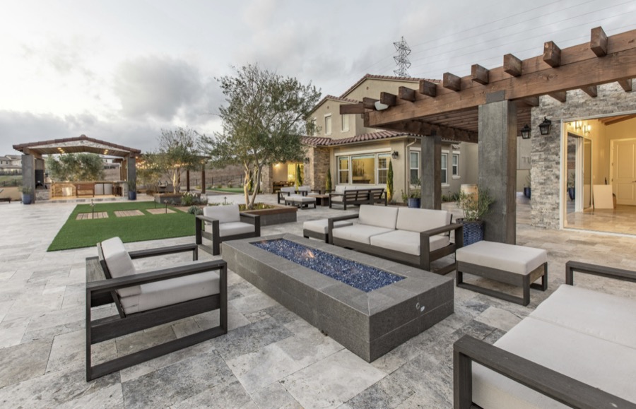 Wood pergola with integrated lighting over paver patio Carlsbad CA by Panjia Outdoors
